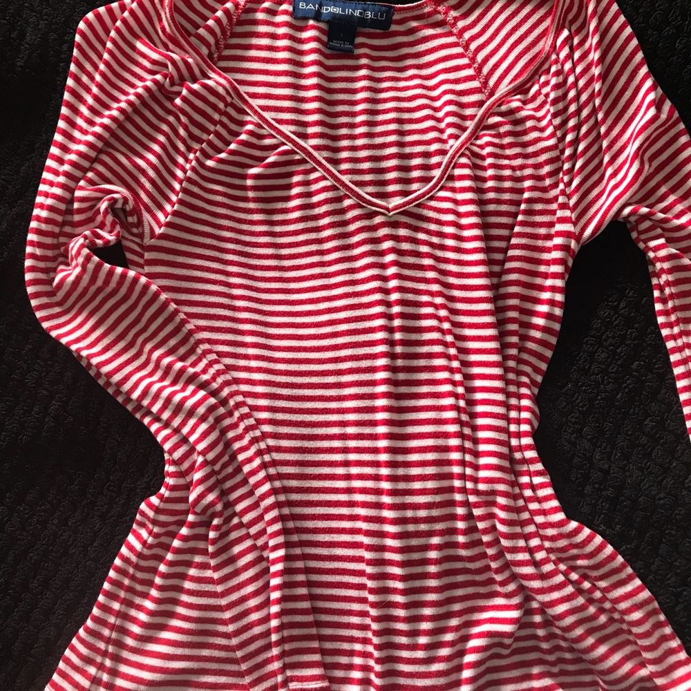 Red and white striped long sleeve top.